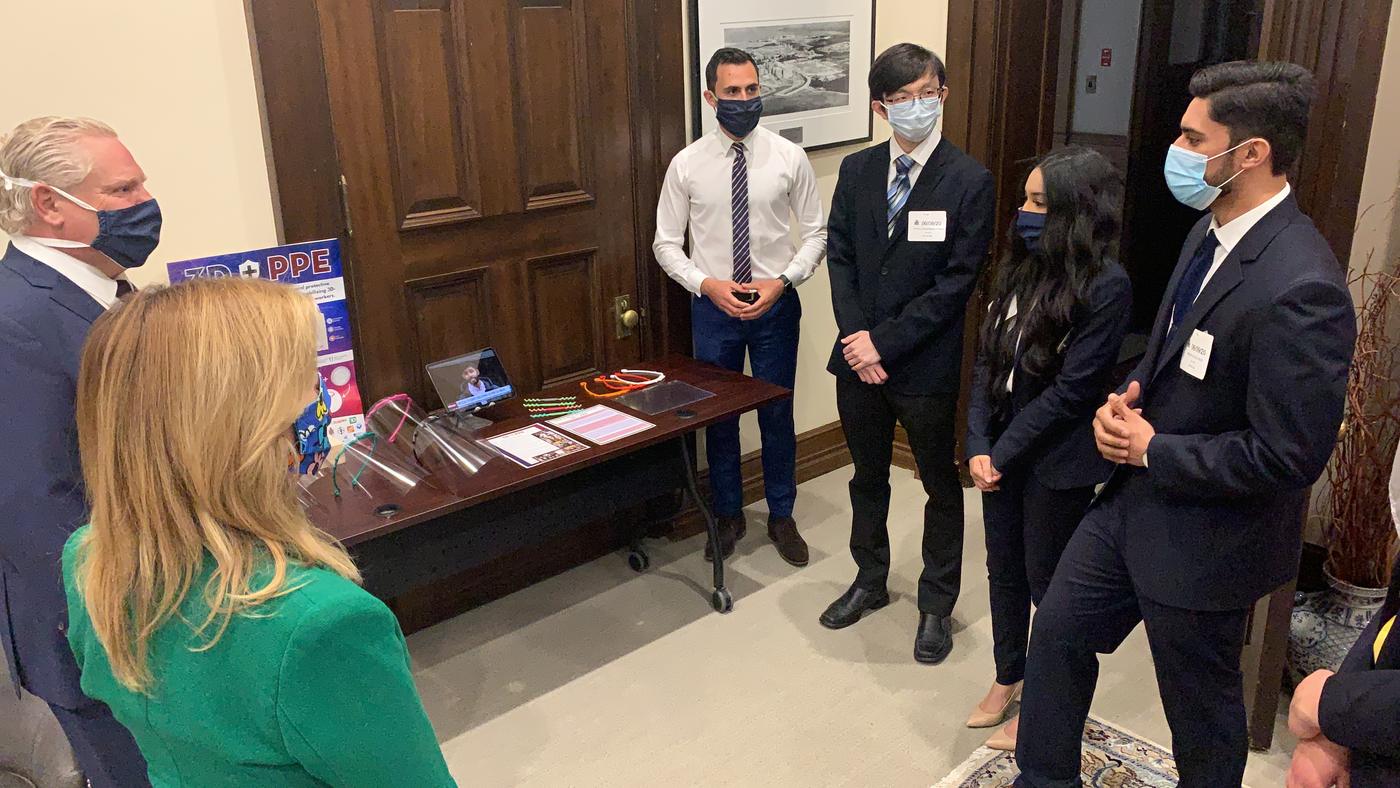 The 3DPPE GTHA team presenting 3D-printed face shields to Ontario Premier Doug Ford and Health Minister Christine Elliott at Queen's Park